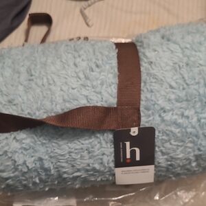 Expressions Light Blue Fleece Throw with Brown Strap